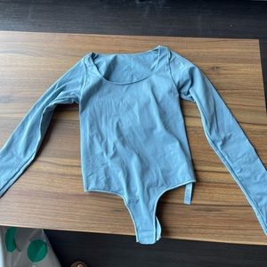 Skims blue body suit